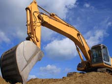 Photo of backhoe digging