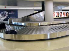 Photo of airport baggage claim area